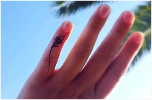 A Beautiful Feather Finger Tattoo